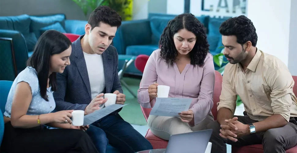 video-indian-employees-sitting-chair-discussing-project